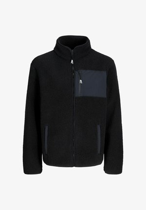 Black fleece jacket with a high collar, zip front, a chest pocket, and side pockets. Features a contrasting dark blue panel on the chest.