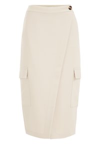 Beige pennkjol med inslag, framsidan knäppning och två sidofickor med klaffdetalj. Tillverkad av ett mjukt, strukturerat tyg.