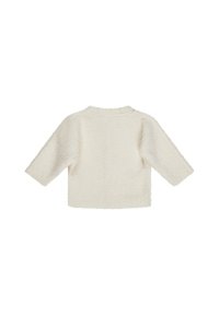 Fuzzy cream-colored pullover with a round neckline and three-quarter sleeves, featuring a soft, textured fabric and a relaxed fit.