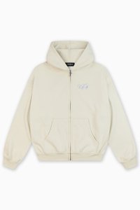 Mikina na zips v svetlej béžovej farbe s jemnou štruktúrou, ktorá má na prednej strane logo v modrej farbe, dve bočné vrecká a kapucňu so šnúrkou.