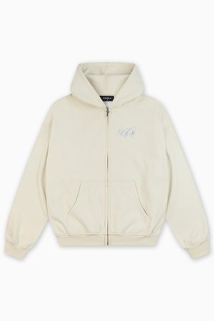 Zipperová mikina v světle béžové látce s měkkou texturou, s předním logem v modré barvě, dvěma bočními kapsami a kapucí s šňůrkou.