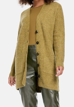 Olivgrüner gestrickter Cardigan mit V-Ausschnitt, vorderen Knöpfen und zwei Taschen. Lange Ärmel mit ribbed Bündchen. Texturiertes, weiches Material.