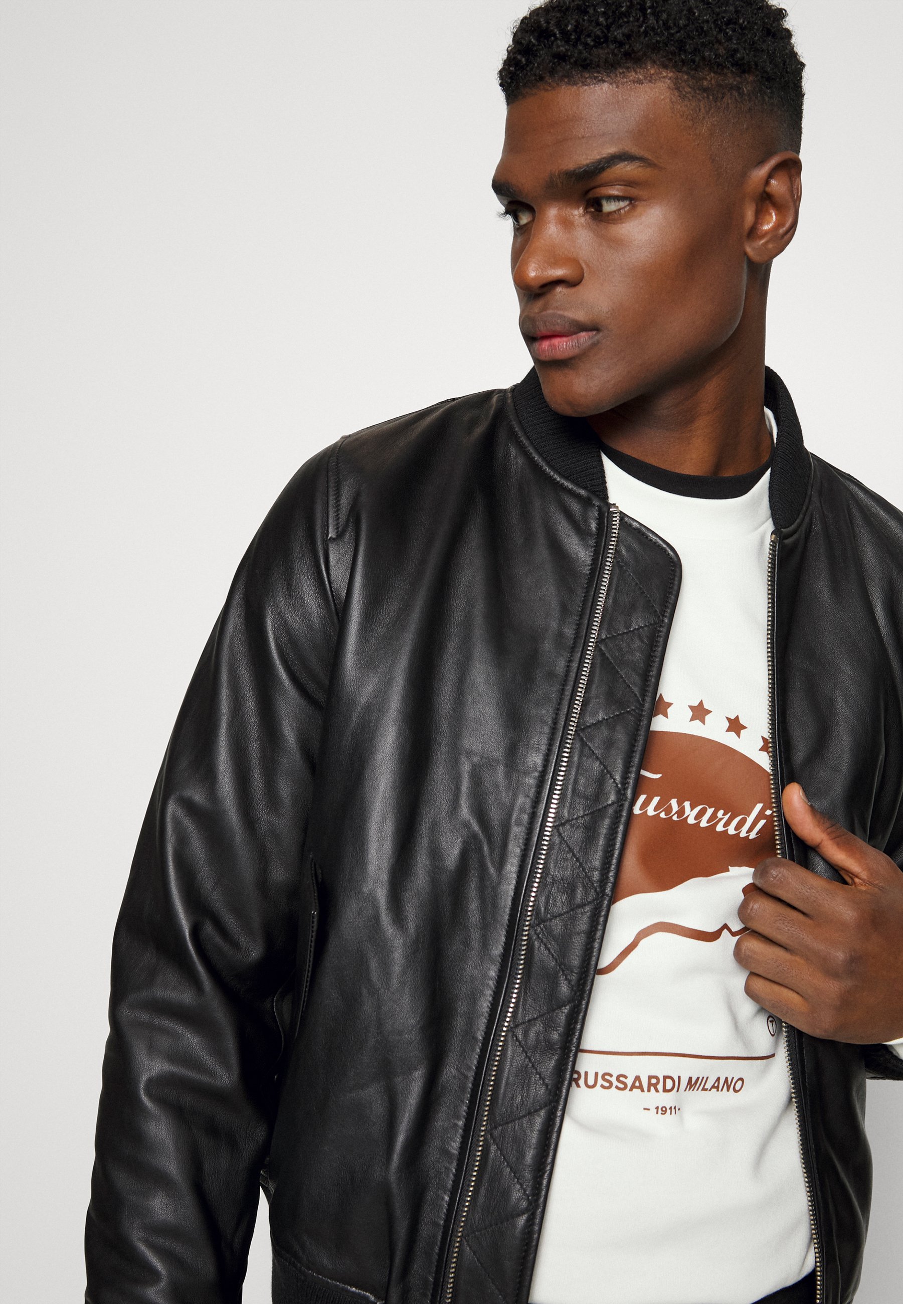 idle man leather jacket