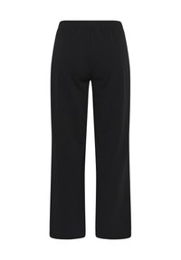 Pantalon noir à jambes larges avec ceinture élastique, vu de dos sur un fond blanc uni.