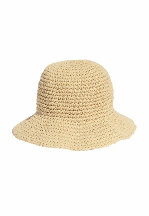Beige crocheted bucket hat with a soft, textured weave and a slightly flared brim for sun protection.