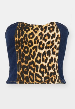 Denim and leopard print tube top featuring a fitted design with a black and gold animal pattern, complemented by dark blue denim sides.