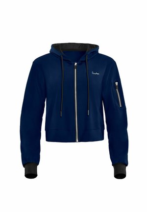 Navy blue cropped hoodie with a black lining, zippered front, drawstring hood, and a left sleeve pocket. Features ribbed cuffs.