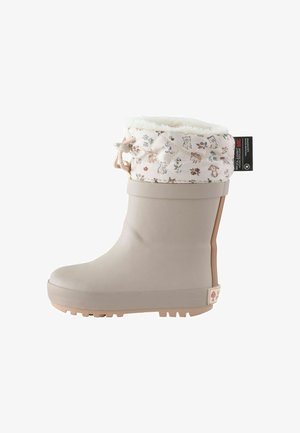 Taaperon kokoiset beige kumisaappaat, joissa on tikattu kukkakuvioinen kangaskalvosin, valkoinen fleecenvuori ja kiristysnauhakiinnitys valkoisella taustalla.