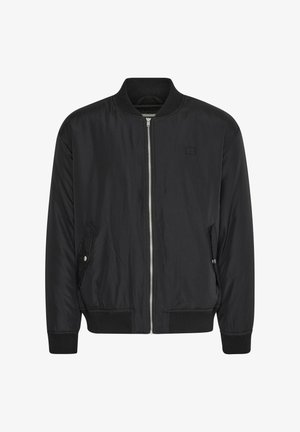 Black bomber jacket with a zip front, ribbed cuffs and waistband, side pockets, and a subtle logo on the chest. Smooth fabric texture.