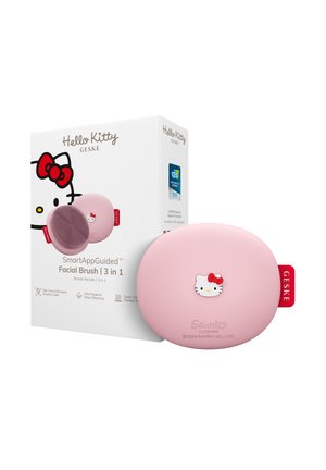 Rosa Hello Kitty-Gesichtsborste und weiße Verpackung mit Markennamen, 3-in-1-Funktion und CES 2023 Innovationspreis-Label.
