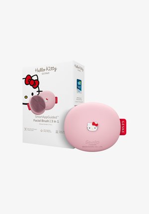 Brosse pour le visage rose à thème Hello Kitty et boîte blanche avec le nom de la marque, fonction 3-en-1 et label du Prix de l'Innovation CES 2023.