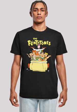 Schwarzes Baumwoll-T-Shirt mit einem bunten Druck von Cartoon-Charakteren aus "Die Flintstones" in einer Steinzeit-Umgebung, mit kräftigen, lebendigen Designs.