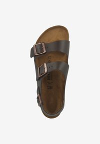 Birkenstock Sandaalit nilkkaremmillä - dark brown