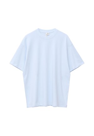 T-shirt ample à manches courtes bleu clair avec un col rond, présenté sur un fond blanc uni.