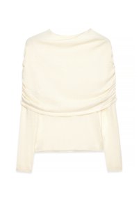 Kreemikaalune pikkade varrukatega tops, laia koonusmütsi kraega, mis langeb õlgadele, valmistatud pehmest kudumiskangast.