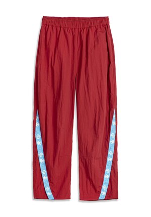 Červené ľahké nohavice s elastickým pásom a modrými bočnými pruhmi so vzorom bielych kvetov a cvokmi.