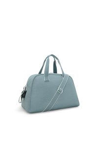 A light blue duffel bag made of soft fabric with a durable design, featuring dual top handles and a detachable shoulder strap.
