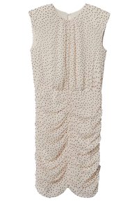 Robe crème froncée à petits pois noirs, manches courtes et encolure ronde. Le tissu a une texture lisse et un drapé doux.