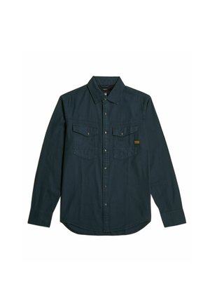 Dark blue long-sleeve shirt in cotton blend, featuring a pointed collar, two chest pockets, and a rounded hem with button closure.