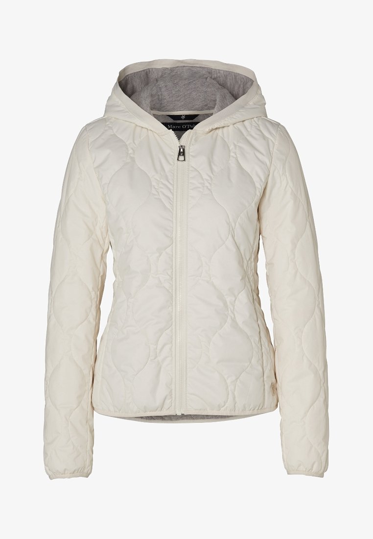 Veste matelassée blanche avec capuche, fermeture éclair intégrale à l'avant, manches longues, et coutures en motif subtil de vagues.