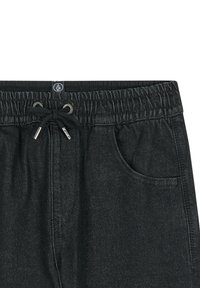 Czarne dżinsowe joggery z elastycznym pasem, detalem ze sznurkiem i kieszenią boczną. Materiał ma delikatną teksturę, zaprojektowany z myślą o komforcie i elastyczności.