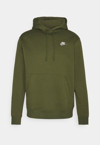 Olivově zelená mikina s kapucí na šňůrku, přední kapsou a bílým logem Nike na levé straně hrudi. Vyrobeno z měkké, texturované bavlněné tkaniny.