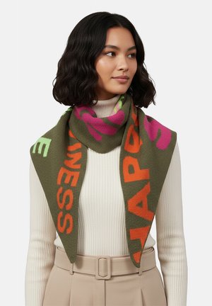 Knit scarf in olive green with bold, contrasting pink and orange text. Soft texture, triangular design draped around the neck.