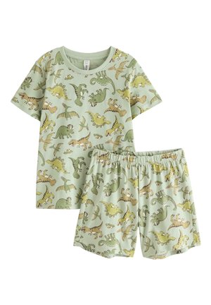 Lasten lyhythihainen paita ja shortsit, joissa on koko kankaan kattava vihreä ja keltainen dinosauruskuvio vaaleanvihreällä kankaalla.