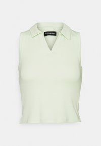 Polo sans manches vert clair avec un col en V. Fabriqué en tissu côtelé, il présente une silhouette ajustée et des détails de couture minimalistes.