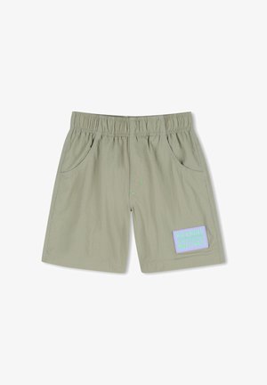 Korte broek met elastische taille in lichtgroene stof, met zijzakken en een rechthoekige patch met kleurrijke tekst waarop staat: "KID'S RULES."