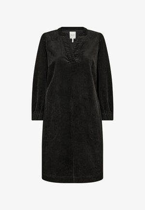 Czarna sukienka z korduroy z dekoltem w kształcie V, długimi rękawami i elastycznymi mankietami. Posiada luźny krój oraz boczne kieszenie dla wygody.