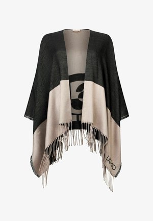 Lightweight shawl in black and beige with fringe edges. Features a bold circular graphic and open front design. Soft texture and drapes elegantly.