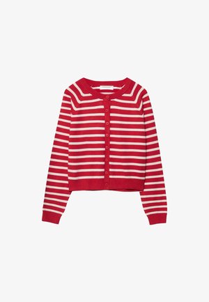 Punainen lyhyt neuletakki, jossa on valkoiset vaakaraidat, pyöreä pääntie ja napitettu edusta. Varustettu pitkillä hihoilla sekä resorireunuksilla hihansuissa ja helmassa.