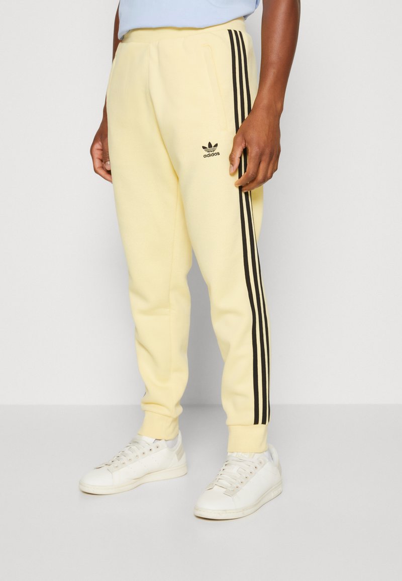 adidas Originals STRIPES PANT UNISEX Jogginghose almost yellow/gelb