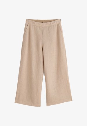Beige wijde cropped broek met elastische tailleband en zijzakken, gemaakt van lichtgewicht stof.