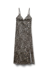 Robe à imprimé animal avec des bretelles fines et ajustables. Fabriquée en tissu lisse, elle présente une fente sur le côté et un motif léopard en noir et beige.