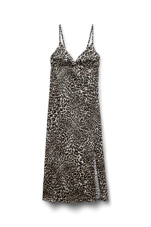 Dierenprint slipdress met verstelbare dunne bandjes. Gemaakt van een gladde stof, met een zijsplit en een luipaardpatroon in zwart en beige.