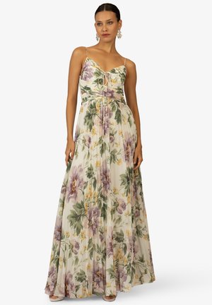 Maxi dress with floral print in pastel colors. Features spaghetti straps, a cinched waist, and sheer, flowing fabric.