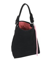 Zwarte suède handtas met een binnenvoering van roze stippen, voorzien van een enkele handgreep en een decoratieve roze franje. Inclusief een ritscompartiment.