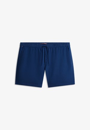 Granatowe męskie szorty kąpielowe z elastyczną talią, sznurkiem do regulacji i bocznymi kieszeniami, ułożone płasko na białym tle.