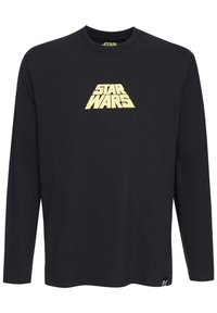 Svart långärmad t-shirt i bomull med en guld "STAR WARS"-logotyp i triangulär form på bröstet. Rund halsringning, avslappnad passform.