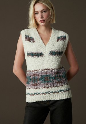 Kremowy kamizelka z dekoltem w kształcie V, z wielokolorowymi paskami w zielonym, brązowym i purpurowym. Miękki, teksturowany materiał dzianinowy.