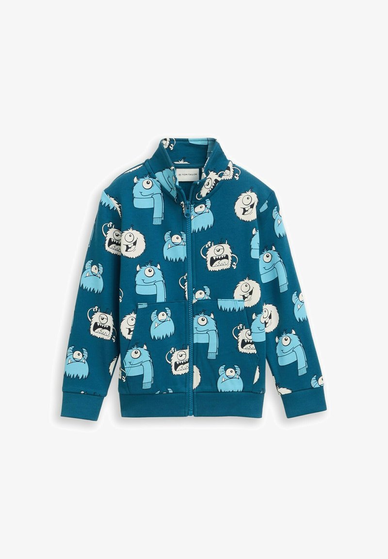 Blauwe ritshoodie met verschillende cartoonmonsterafdrukken in lichtblauw en wit. De stof is zacht en heeft een structuurafwerking.