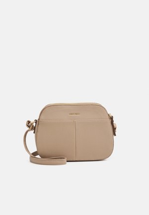 Beige crossbody bag with a textured finish, zip closure, and adjustable strap. Features front slip pockets and gold-tone logo detail.