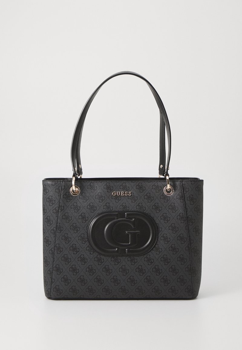 Sac cabas noir Guess avec impression du logo à motifs, double poignée et emblème "G" en relief à l'avant.
