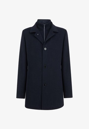 Granatowy płaszcz z wełny z domieszką, z kołnierzem, przednim zamkiem i pięcioma guzikami. Prosty fason z długimi rękawami o gładkiej teksturze.