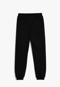 Schwarze Sweatpants aus weichem Material, mit einem taillierten Bein-Design und einem elastischen Bund sowie Ärmelbündchen für eine angenehme Passform.
