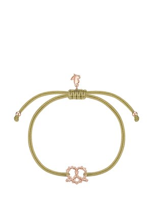 Pulsera de cordón verde oliva ajustable con un charm en forma de corazón de oro rosa en el centro y pequeños extremos de cuentas de oro rosa.