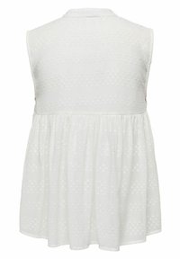 Blusa blanca sin mangas con un patrón de puntos texturizados, que presenta una sección inferior con pliegues y un collar en la parte posterior. Tela suave, corte casual.