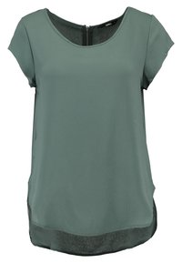 Blusa corta de manga corta color verde claro con escote redondo y cierre en la parte posterior. Presenta una tela texturizada y un dobladillo trasero ligeramente más largo.